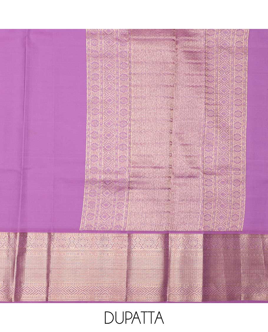 Yellow pure silk half-saree,  jacquard skirt, contrast border of thilakam mokku,banaras, mayil kann,cross kamalam, and then kuli kann , contrast zari blouse, and zari design dhavani