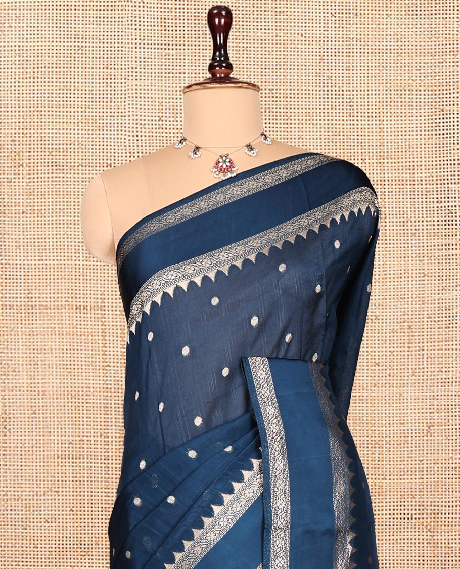 Blue Matka Silk Saree, Accentuated with Buttas All Over Its Body, Highlighted by Temple Rettai Pettu Border, Pallu of Meenakari Flora Designs, and Paired with a Matching Blouse
