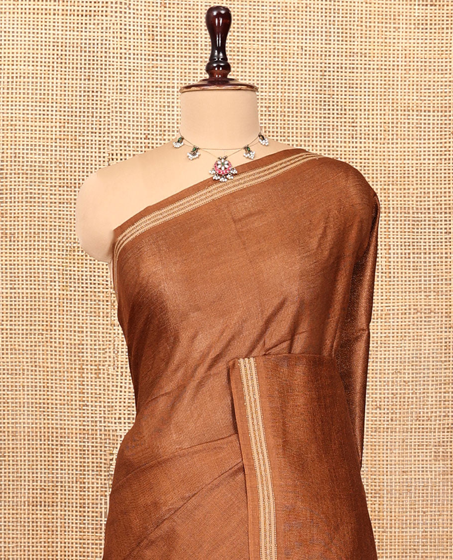 Brown Plain Tussar Silk Saree, a Piping Border, Self-Pallu of Stripes, and Matching Blouse