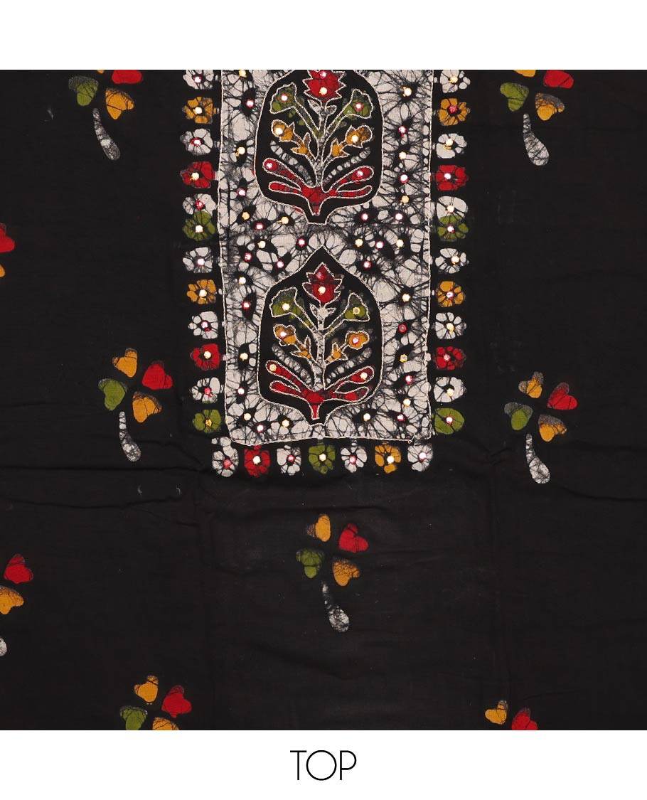 Black material churidar set, colorful batik print, thread outline embroidery, and mirror work cotton top, contrast batik printed cotton bottom, and batik printed chiffon dupatta