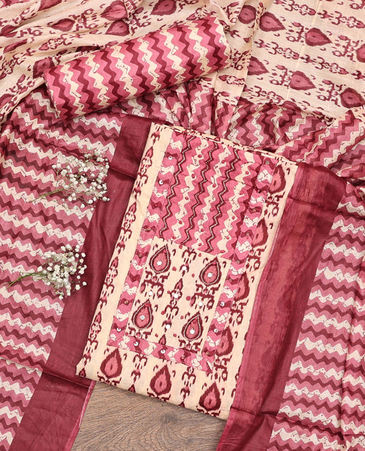 Sandal-Base and Red Cotton Material Chudidar Set, Adorned with Batik-Style Intricate Print on Its Top, a Batik Chevron Printed Cotton Bottom, and Paired with an Intricately Printed Dupatta