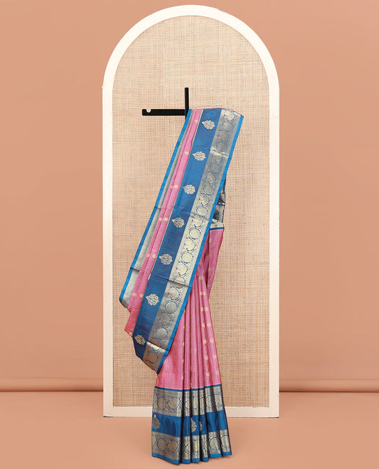 Pink Venkatagiri Silk Saree, Enlivened with Zari Buttas Enclosed Checks All Over Its Body, Complemented by a Contrast Traditional Zari Design Border of Peacock-Chakram Designs, Traditional Design Pallu, and Paired with a Contrast Blouse