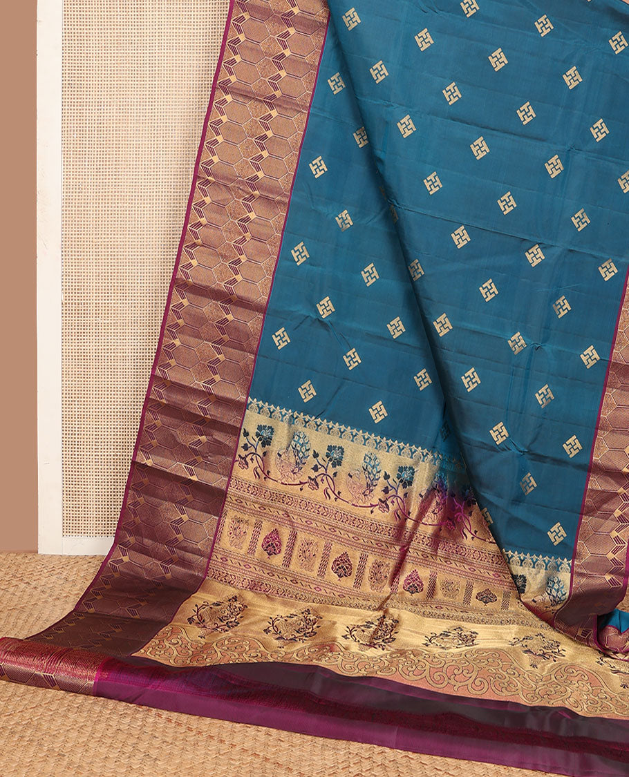 Blue zari buttas silk saree, contrast geometric border & pallu of floral & peacock designs