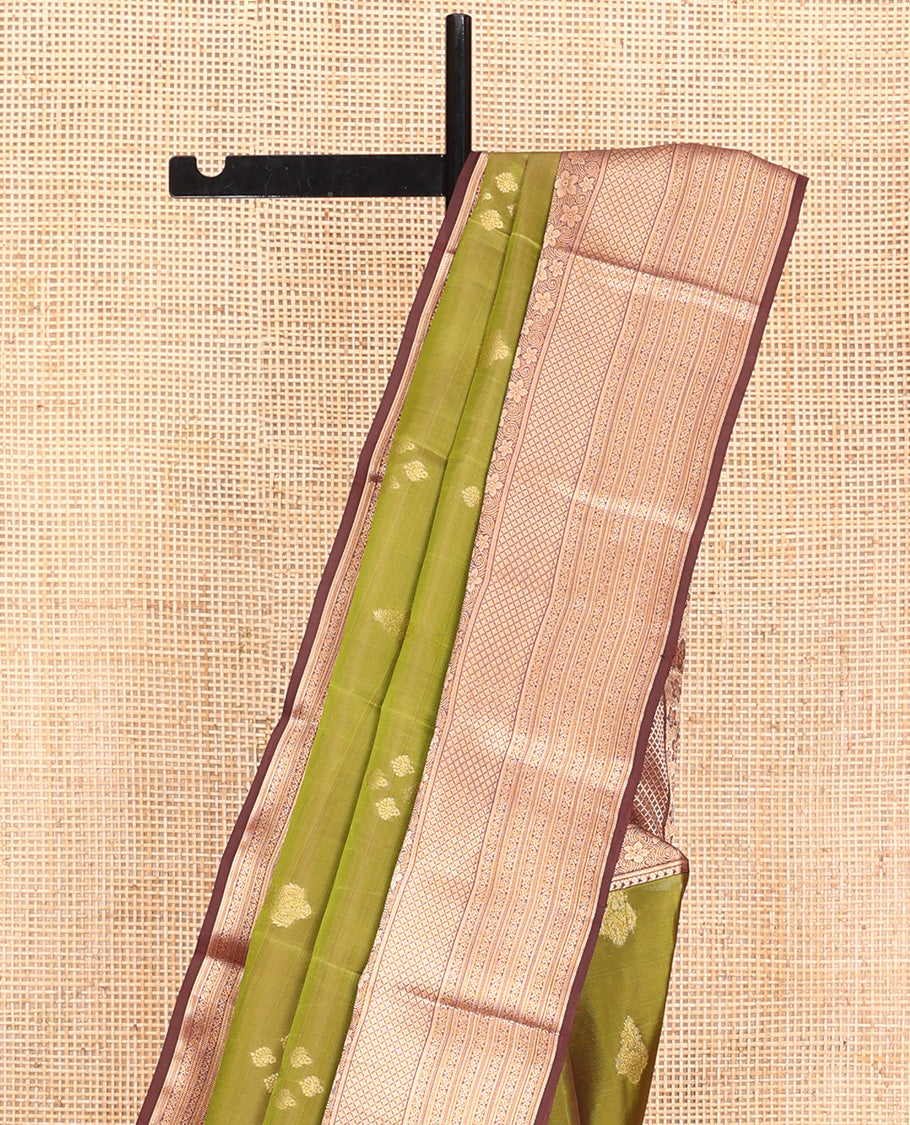 Green Vasundhara Lite Silk Mix Saree, Elegantly Framed with Zari Buttas All Over Its Body, Complemented by Contrast Border of Manga, Floral, Jaal, and Kodi Visiry Designs, Grand Jaal Pallu and Paired with a Contrast Blouse