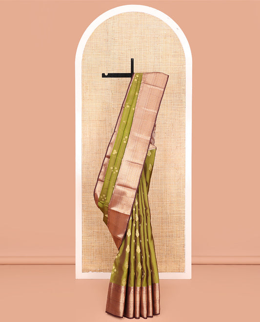 Green Vasundhara Lite Silk Mix Saree, Elegantly Framed with Zari Buttas All Over Its Body, Complemented by Contrast Border of Manga, Floral, Jaal, and Kodi Visiry Designs, Grand Jaal Pallu and Paired with a Contrast Blouse