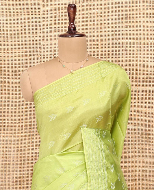 Green Banana Pith Saree, Sparsely Woven with Buttas All Over Its Body, Subtle Striped Border, Pallu Steeped with Stripes, and Paired with a Matching Blouse