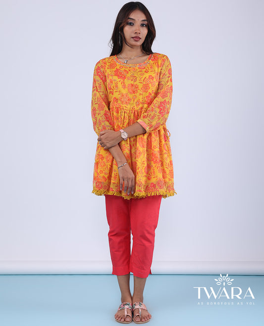 Twara marigold orange floral vine printed with bead embroidery 3/4th sleeve tie-up tassel top
