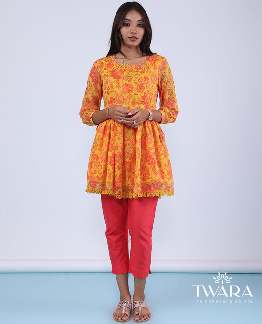 Twara marigold orange floral vine printed with bead embroidery 3/4th sleeve tie-up tassel top