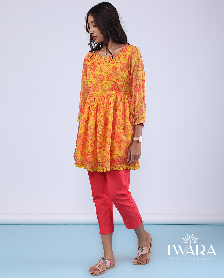 Twara marigold orange floral vine printed with bead embroidery 3/4th sleeve tie-up tassel top