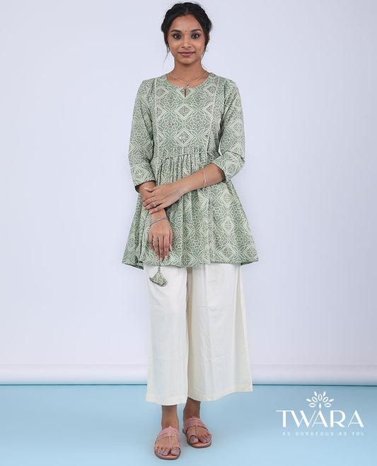 Twara green bandhani-style intricately printed with mirror embroidery 3/4th sleeve tie-up top