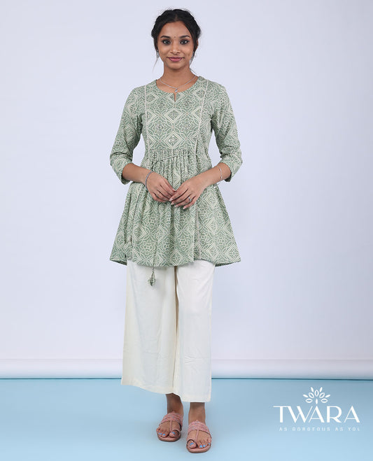 Twara green bandhani-style intricately printed with mirror embroidery 3/4th sleeve tie-up top