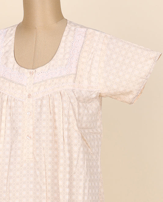 Cream intricately printed round neck cotton half-sleeve button-type nighty