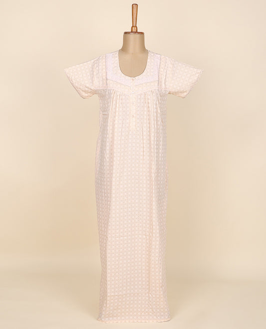 Cream intricately printed round neck cotton half-sleeve button-type nighty