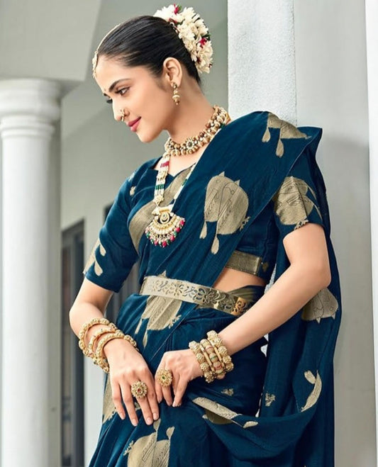 Blue Designer Saree, Prettified with Zari Buttas, Featuring a Self-Border Depicting Sparrow Motifs, Subtly Woven Pallu of Spare Stripes, and Paired with a Matching Blouse of Sparrow Motifs