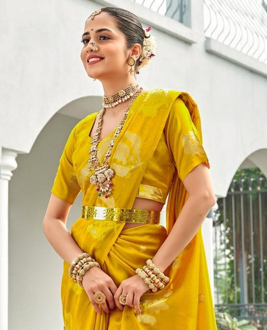 Yellow Designer Saree Detailed with Zari Buttas, Featuring a Self-Border Depicting Parrot Motifs, Subtly Woven Pallu of Spare Stripes, and Paired with a Matching Blouse of Parrot Motifs