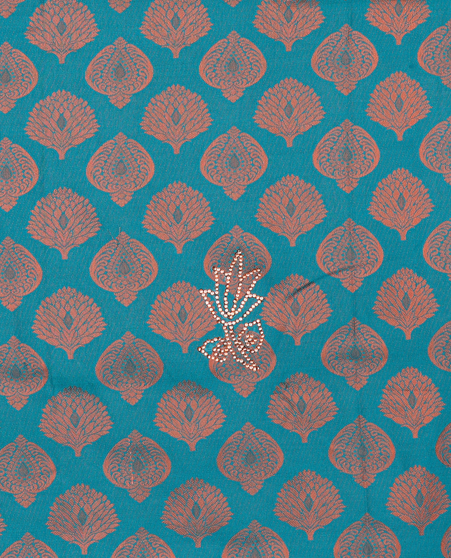 Blue silksaree with zari buttas & stone work, zari border & intricate floral design weave pallu with stone embroidery