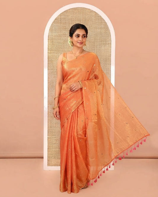 Borderless Orange Fendy Chiffon Saree, Gleamed Up with Sequin Work on Its Body, Highlighted by a Self-Pallu of Sequin Work, and Paired with a Matching Blouse