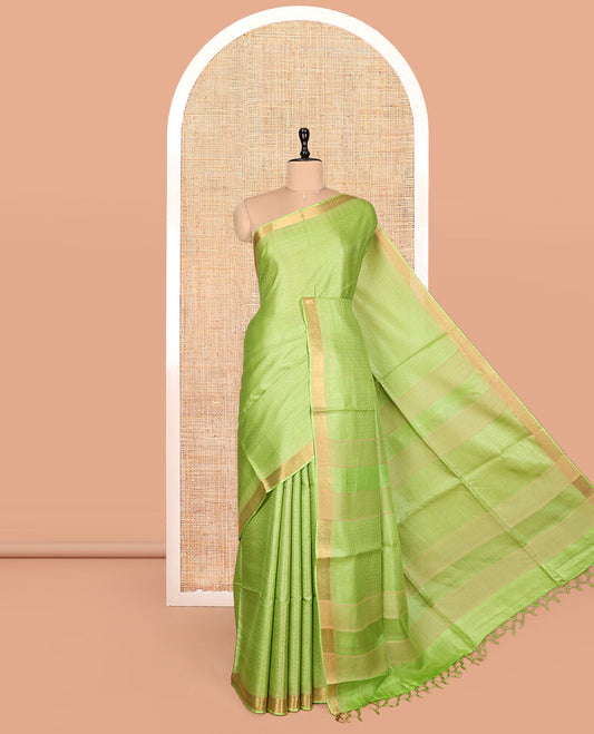 Parrot Green Sparsely Textured Tussar Silk Saree, a Subtle Piping Border, a Self-Pallu, and a Matching Blouse