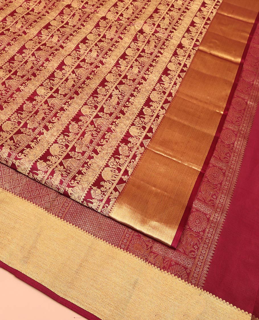 Maroon Kanchipuram Wedding Silk Saree, Artfully Woven with Warli Village Theme Motifs in Jacquard Weave, Highlighted by Thick Zari Border, Grand Jaal Pallu and Paired with a Matching Blouse