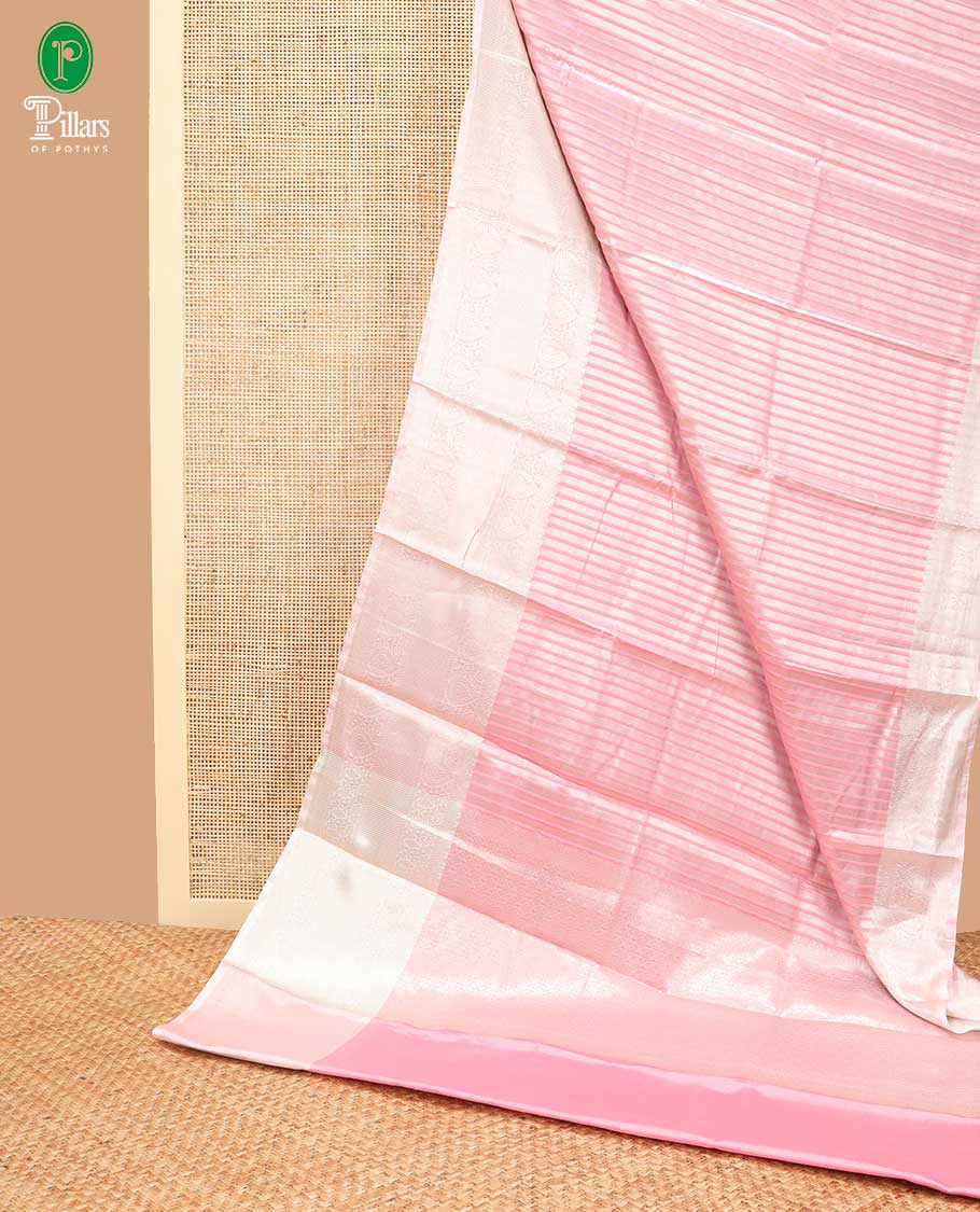 Baby pink vertical design banaras kora tissue saree with contrast gold zari jacquard border weaving rich pallu along with brocade blouse