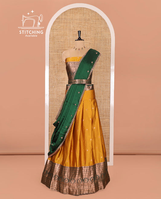 Yellow and Green Semi-Banarasi Half-Saree Prettified with Zari Buttas on Its Skirt, Complemented by a Contrast Traditional Zari Design Steeped Border, Paired with a Matching Blouse, and a Satin Georgette Embroidered Scallop Dhavani