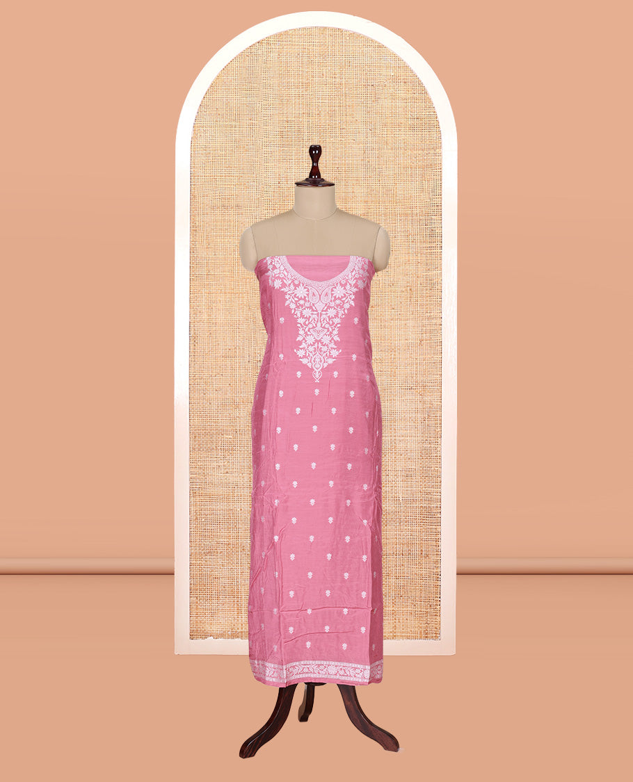Peach Viscose Muslin Material Churidar Features Buttas Thread Woven Top, a Santoon Bottom, and Floral Jaal Dupatta