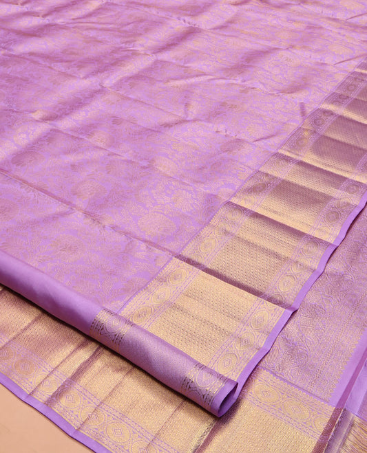 Lavender Kanchipuram Wedding Silk Saree, Decorated with Jacquard Design, a Zari Border of Neli, Poun, and Mayil Kann Designs, Jaal Pallu, and a Matching Blouse