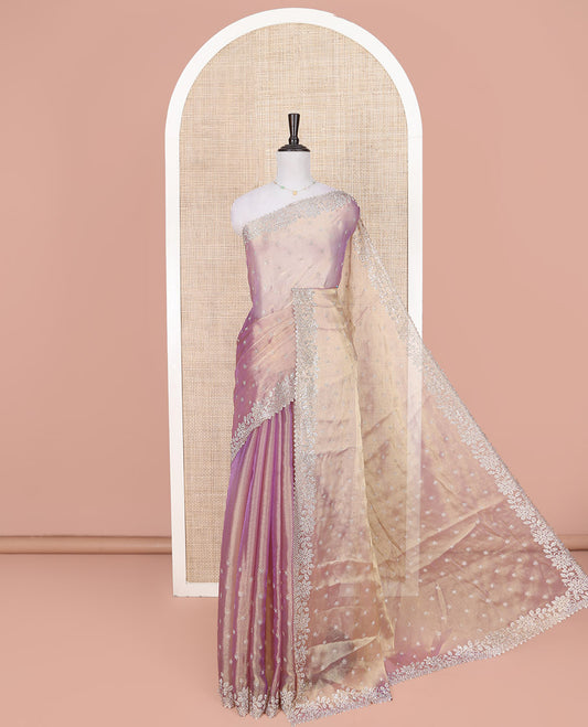 Lavender Designer Saree, Dazzled with Stone Embroidered Buttas on Its Body, Highlighted by a Scallop Stone Work Border, Pallu of Stone Embroidered Buttas, and Paired with a Matching Blouse
