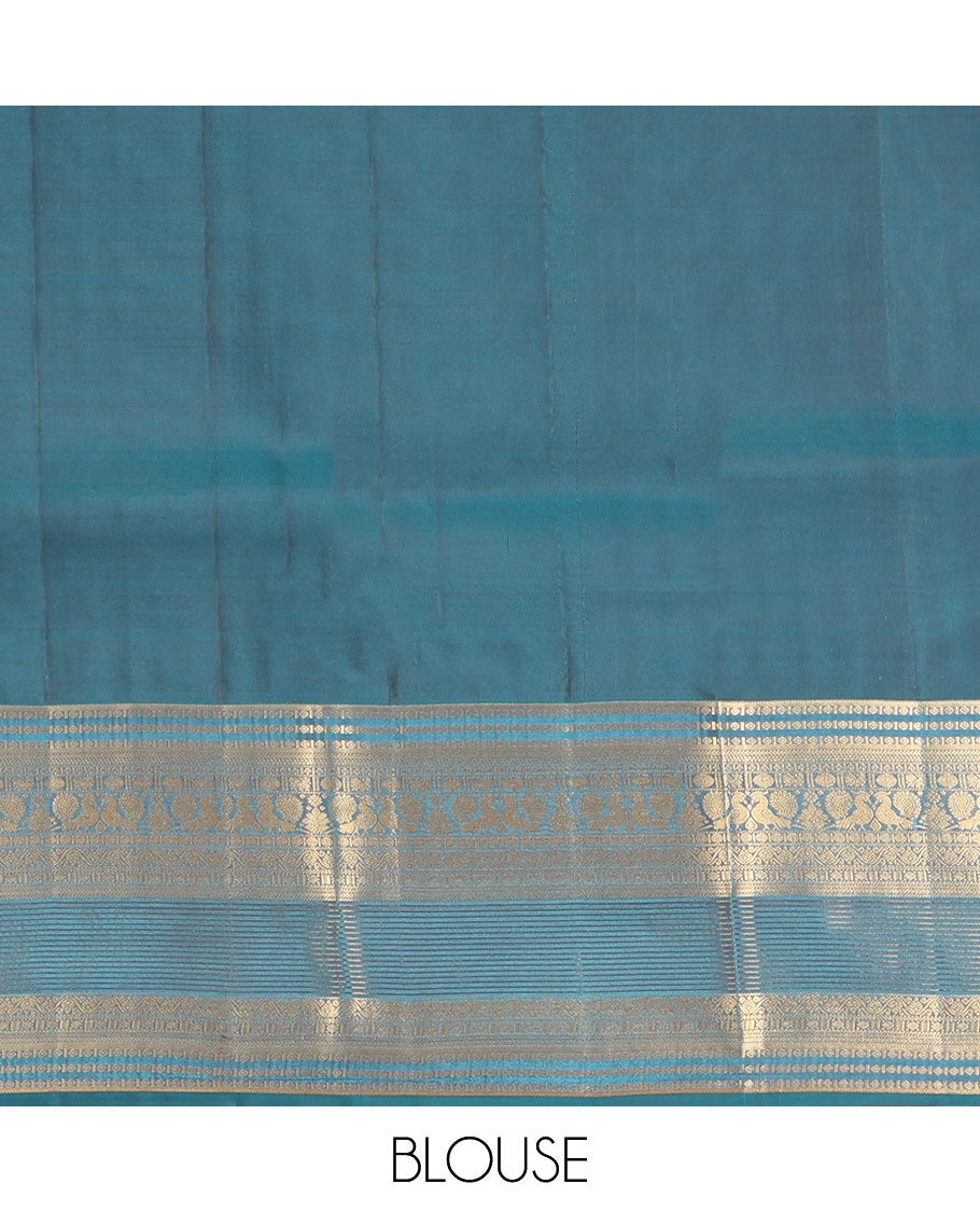 Rust Vasundhara Lite Silk Mix Saree, Elevated with Zari Buttas on Its Body, Complemented by a Contrast Traditional Zari Border of Mayil and Chakram Designs, Pallu Features Chevron Designs, and Paired with a Contrast Blouse