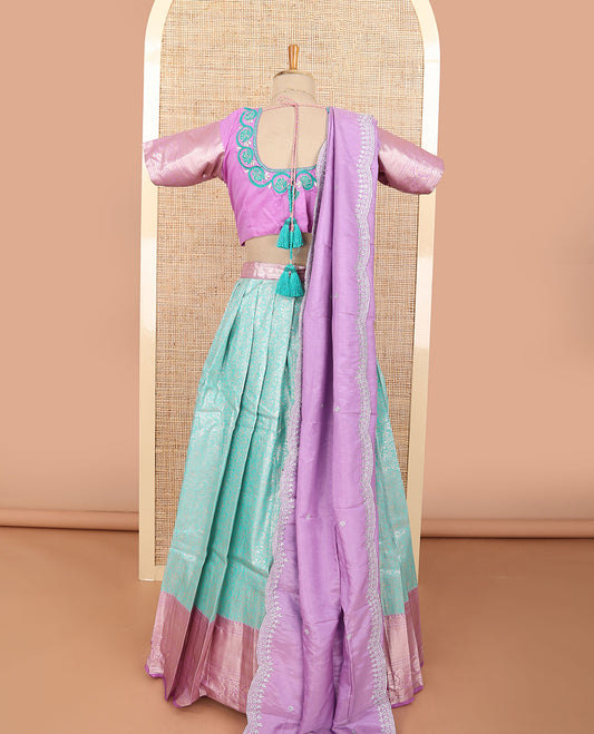 Sea blue floral jacquard half saree with contrast zari design border, floral embroidered blouse & floral embroidery dhavani