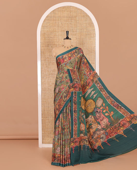 Leaf green kalamkari floral vine printed Italian crepe saree, contrast kalamkari floral creeper printed border, pallu of Pichwai and kalamkari print, and a plain blouse