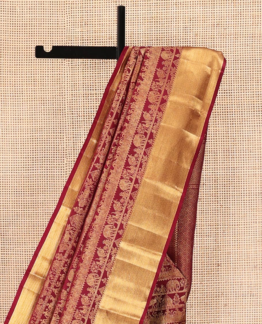 Maroon Kanchipuram Wedding Silk Saree, Artfully Woven with Warli Village Theme Motifs in Jacquard Weave, Highlighted by Thick Zari Border, Grand Jaal Pallu and Paired with a Matching Blouse
