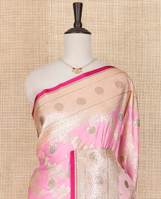 Pink Art Vastrakala Silk Saree Prettified with Floral Jaal Jacquard with Stone Work All Over Its Body, Adorned with Floral Creeper Zari Stone Work Border, Pallu Detailed in Zari and Stone Work, and Paired with a Contrast Blouse