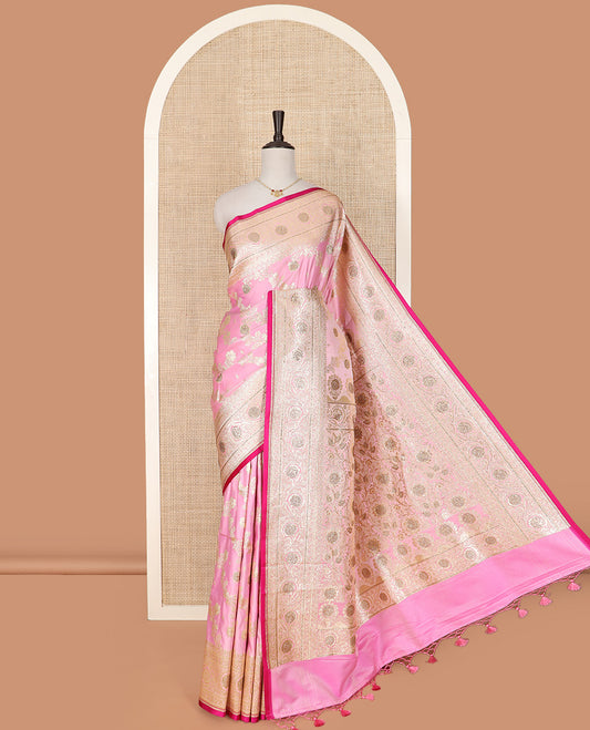 Pink Art Vastrakala Silk Saree Prettified with Floral Jaal Jacquard with Stone Work All Over Its Body, Adorned with Floral Creeper Zari Stone Work Border, Pallu Detailed in Zari and Stone Work, and Paired with a Contrast Blouse