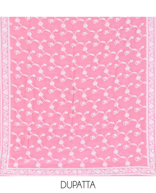 Peach Viscose Muslin Material Churidar Features Buttas Thread Woven Top, a Santoon Bottom, and Floral Jaal Dupatta