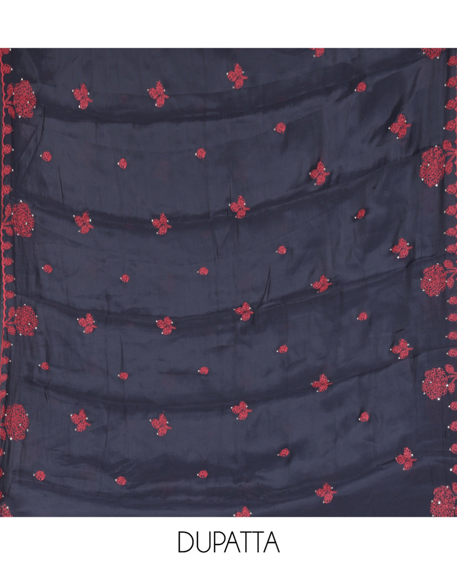 Black Mul Chanderi Material Churidar Features Floral Vine Embroidery Top, a Plain Bottom, and a Embroidered Dupatta