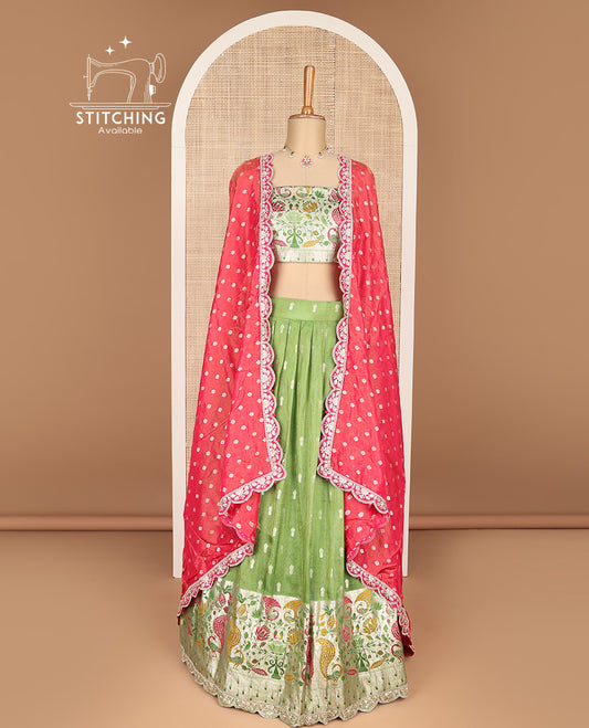 Green buttas banaras half saree with contrast intricate design border, zari design blouse & floral design dhavani