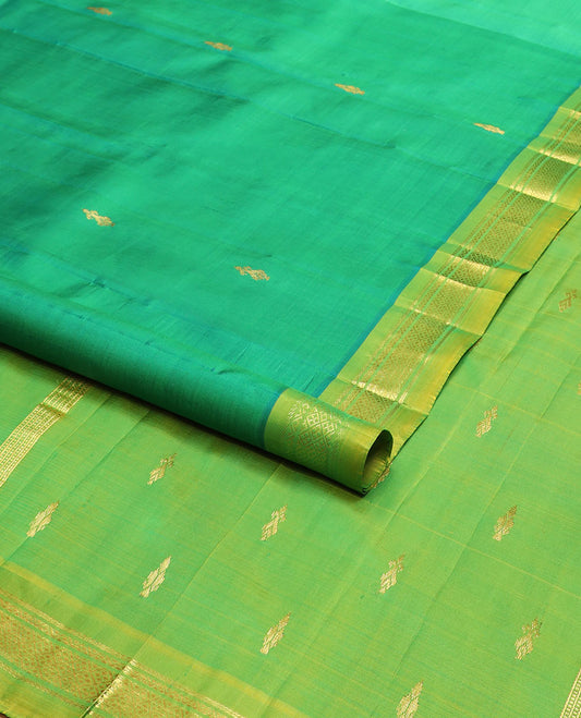 Green zari buttas Kanchipuram silk saree, contrast one-sided border of banaras, neli & jaal & zari design pallu