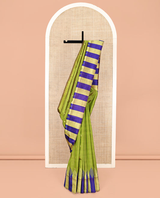 Green Kanchipuram Silk Saree, Woven with Zari Buttas, Complemented by a Contrast One-Sided Temple Border, Zari Design Pallu, and No Blouse