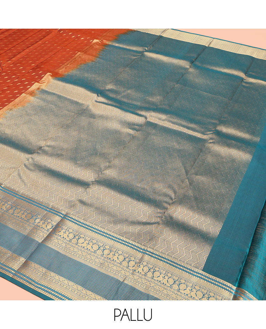 Rust Vasundhara Lite Silk Mix Saree, Elevated with Zari Buttas on Its Body, Complemented by a Contrast Traditional Zari Border of Mayil and Chakram Designs, Pallu Features Chevron Designs, and Paired with a Contrast Blouse