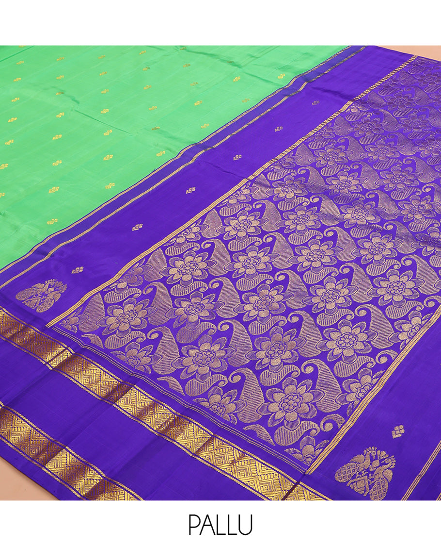 Green Kanchipuram Silk Saree, Woven with Zari Buttas, a Contrast One-sided Korvai Border of Diamond, and Mayil Designs, Pallu of Floral and Paisleys, and No Blouse