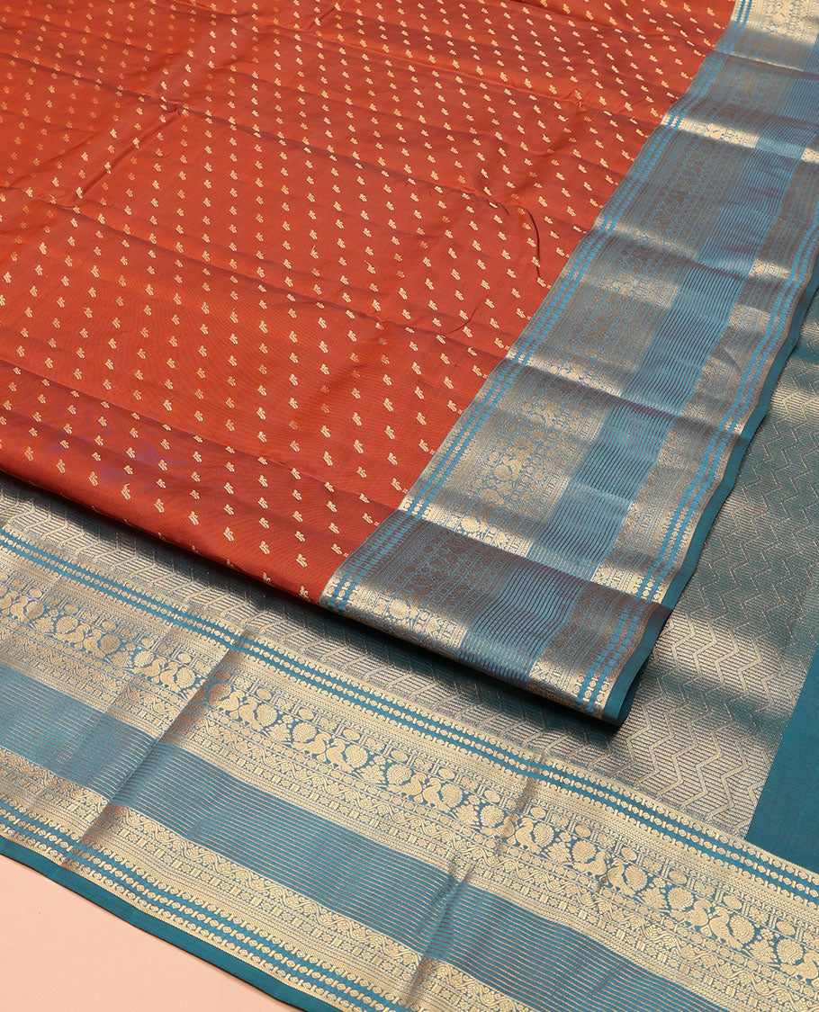 Rust Vasundhara Lite Silk Mix Saree, Elevated with Zari Buttas on Its Body, Complemented by a Contrast Traditional Zari Border of Mayil and Chakram Designs, Pallu Features Chevron Designs, and Paired with a Contrast Blouse