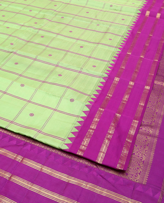 Green Vasundhara Silk Saree, Delicately Woven with Butta Enclosed Checks, Complemented by a Contrast Thazampoo Rekku Border of Banaras, Intricately Designed Pallu, and a Contrast Blouse