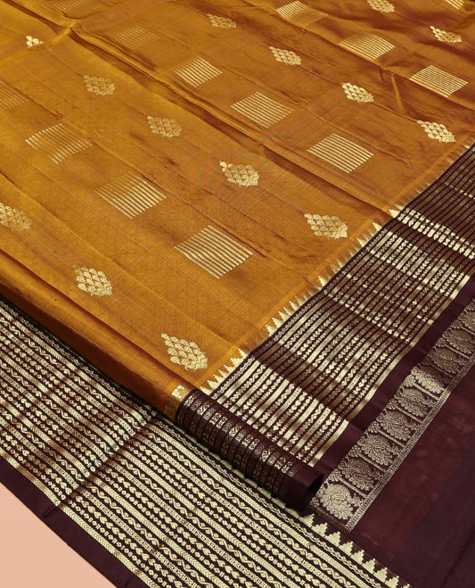 Mustard Venkatagiri Silk Saree, Finely Crafted with Zari Buttas All Over Its Body, Complemented by a Contrast Traditional Zari Design Border, Grand Pallu, and Paired with a Contrast Blouse