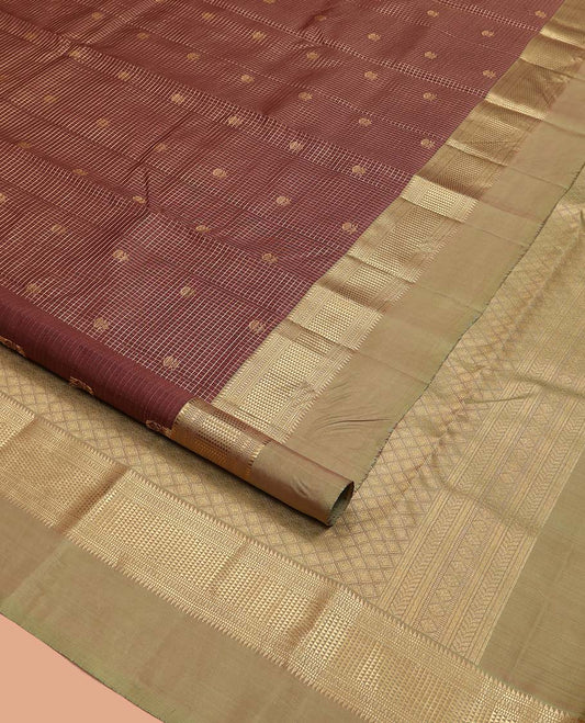 Brown Vasundhara Silk Saree, Prettified with Zari Buttas and Checks All Over Its Body, Complemented by a Contrast Kal Eragina Border of Ara Bogudi, Muthu, and Ara Maadam Designs, Grand Jaal Pallu, and Paired with a Contrast Blouse
