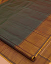 Green Muthu Kattam Kanchipuram Silk Saree, Complemented by Contrast Bodi Border, Striped Pallu, and a Contrast Blouse
