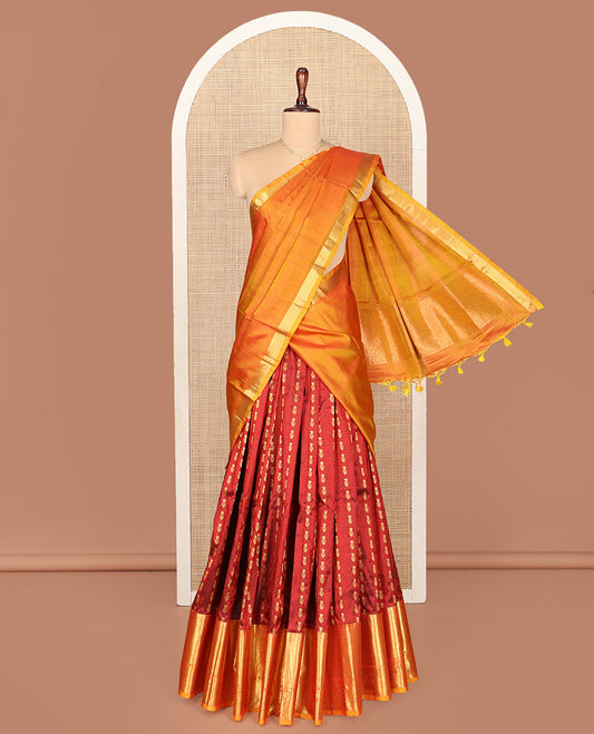 Maroon Pure Silk Half-Saree, Delicately Woven with Zari Buttas All Over Its Skirt, Complemented by a Contrast Border of Jaal, Floral, and Paisley Designs, Paired with a Contrast Blouse, and Comes with a Jaal Design Dhavani