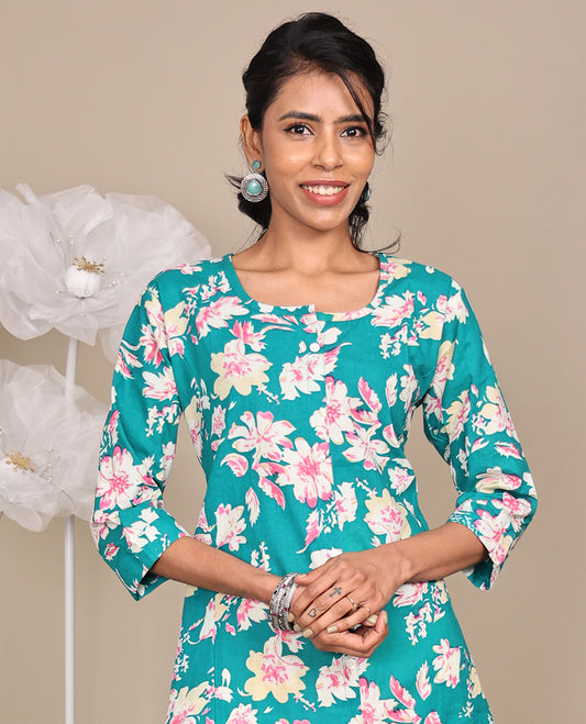 Blue Floral Printed Knee-Length Rayon Kurti, Beautified with Round Neckline, 3/4 Sleeves, and A-Line Length