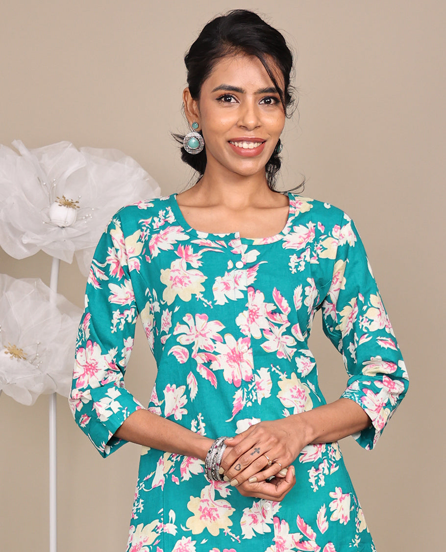 Blue Floral Printed Knee-Length Rayon Kurti, Beautified with Round Neckline, 3/4 Sleeves, and A-Line Length