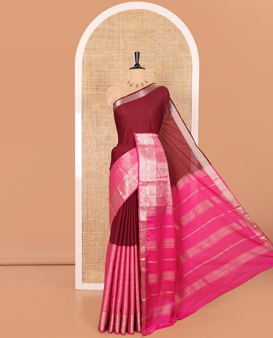 Wine and Rani Pink Half-And-Half Style Art Crepe Saree Artfully Detailed with Plain and Jacquard Design, Complemented by a Contrast Border of Traditional Zari Designs, Pallu Featuring Zari Stripes, and Paired with a Matching Blouse